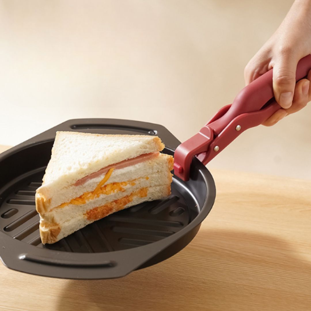 HeatHold™- Pinza Antideslizante Resistente al Calor para Cocina